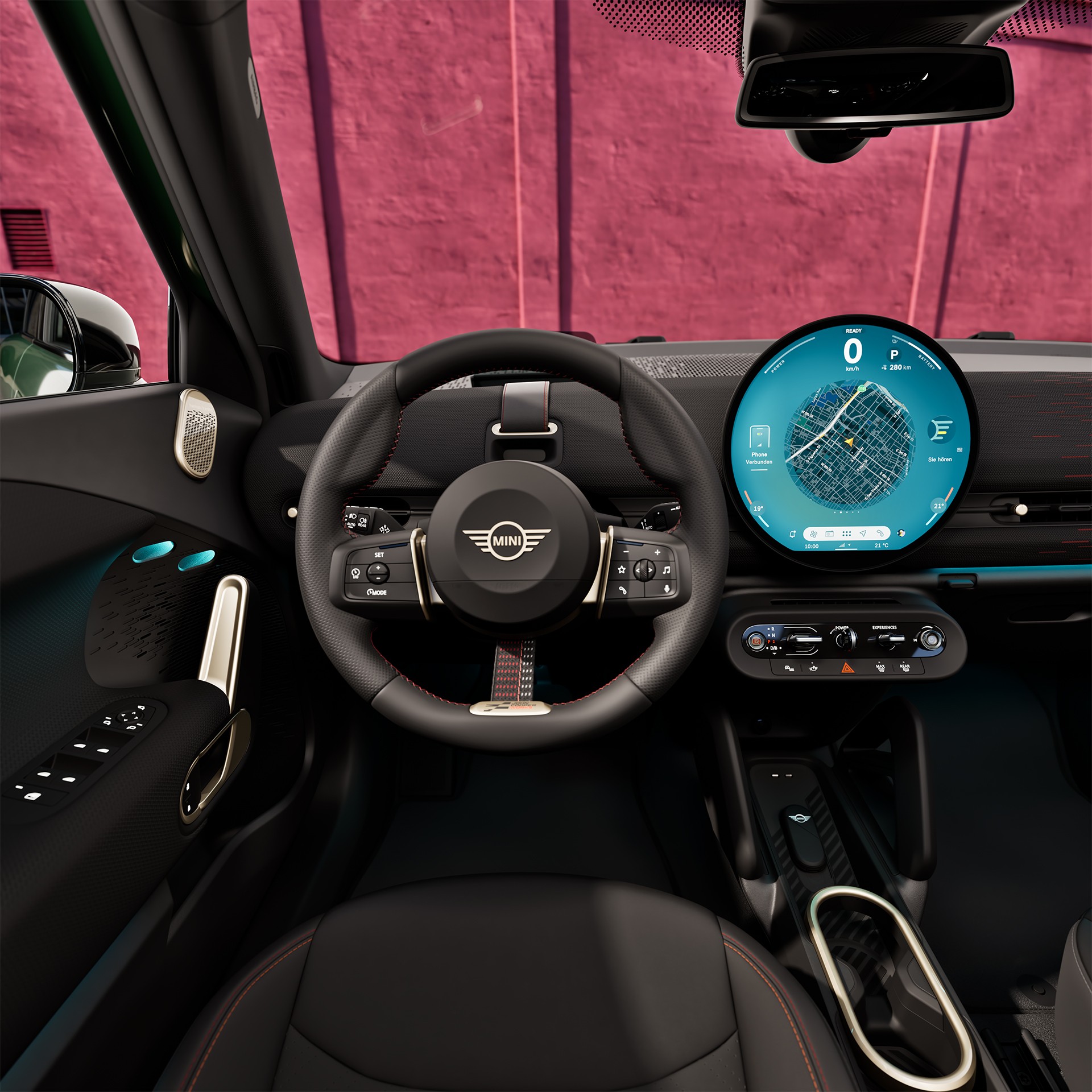 Interior view of all-electric MINI Aceman with blue seats and view through the panoramic sun roof